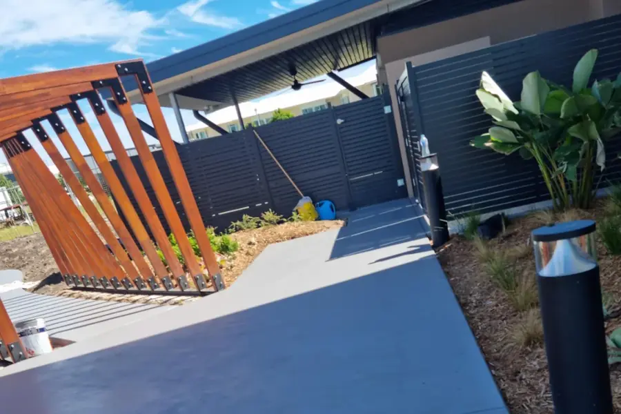 A freshly painted and landscaped commercial outdoor seating area