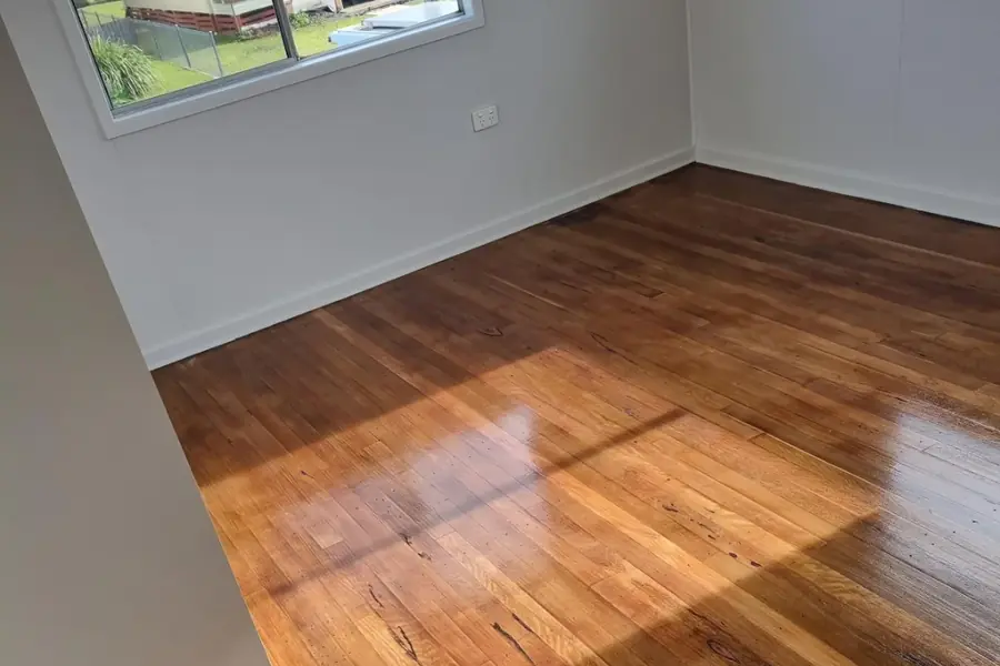 A polished timber floor corner in a freshly completed room